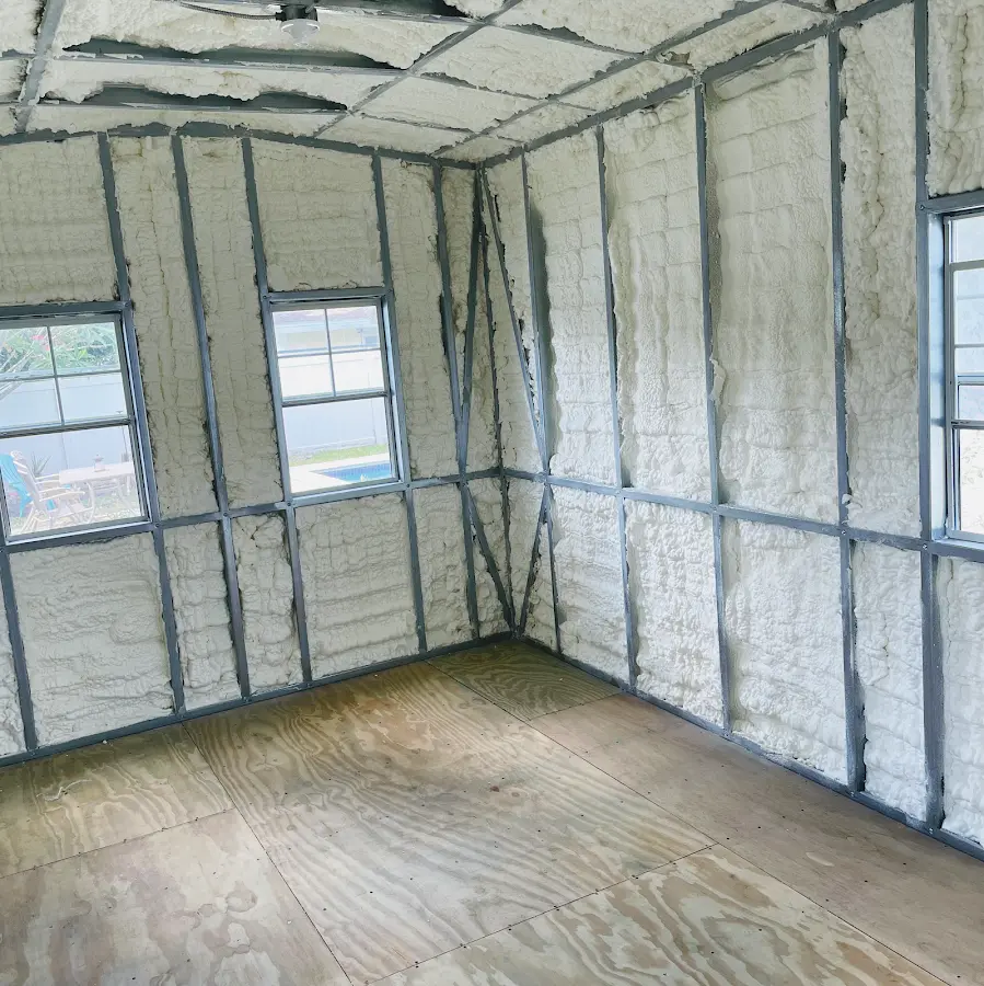 Closed-cell spray foam insulation applied to wall cavities in a residential project in Evanston